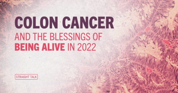 An illustration that shows cancer cells topped with text reading "Colon Cancer and the Blessings of Being Alive in 2022"
