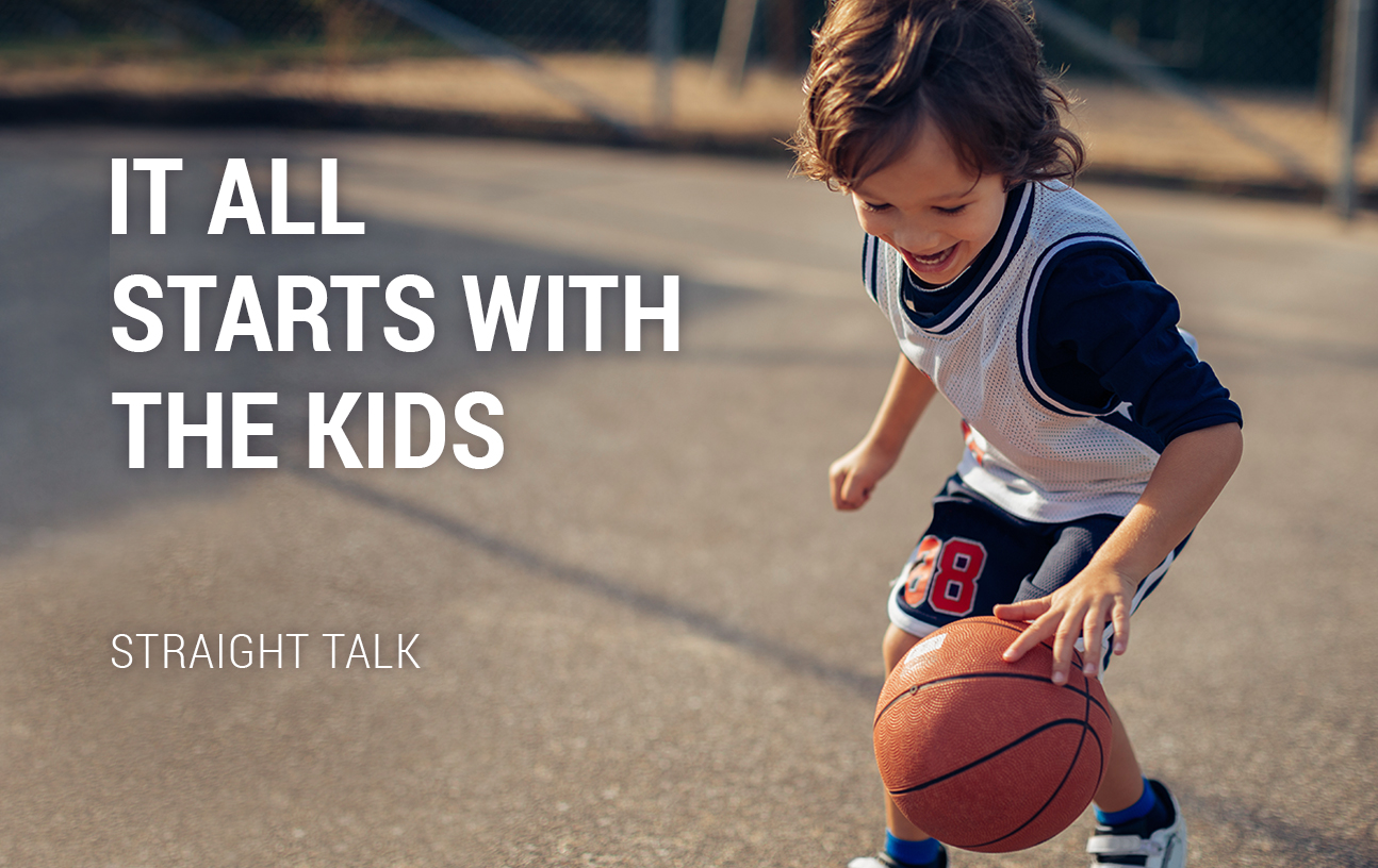 Picture of a kid playing basketball